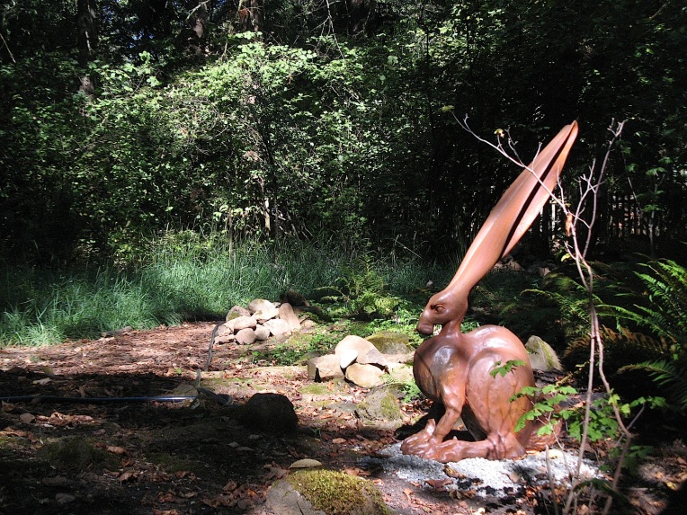 Large scale ceramic sculpture by Steve Eichenberger, in an Oregon native plant garden.